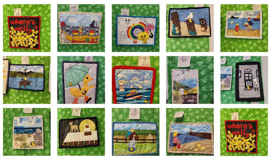 14 RNLI yellow wellie wall-hangings.