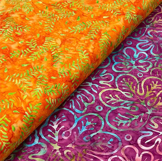 Batik fabrics in orange and magenta