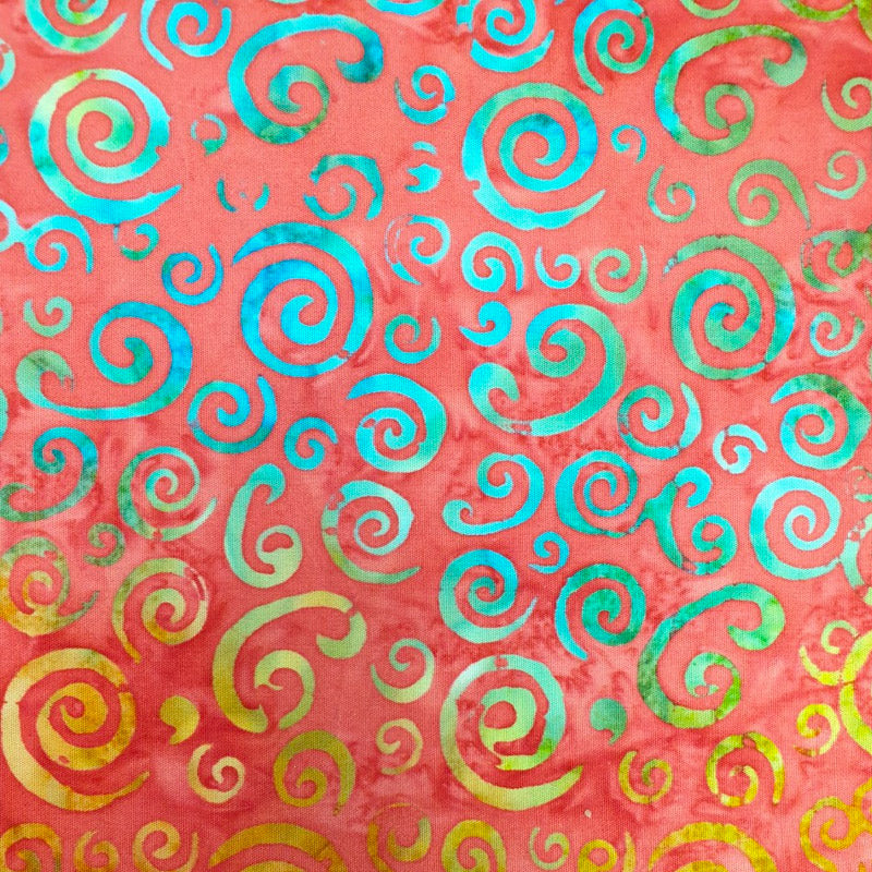 batik with illuminous swirls on a fiery red background