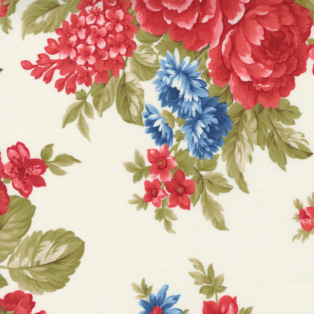 Belle Isle fabric from Moda with red  and blue large flowers on a cream background