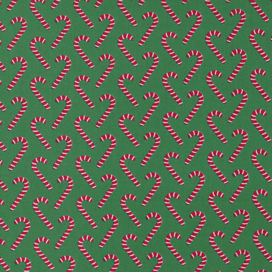Candy Cane Lane from Moda Red candy canes on green background 24124 17