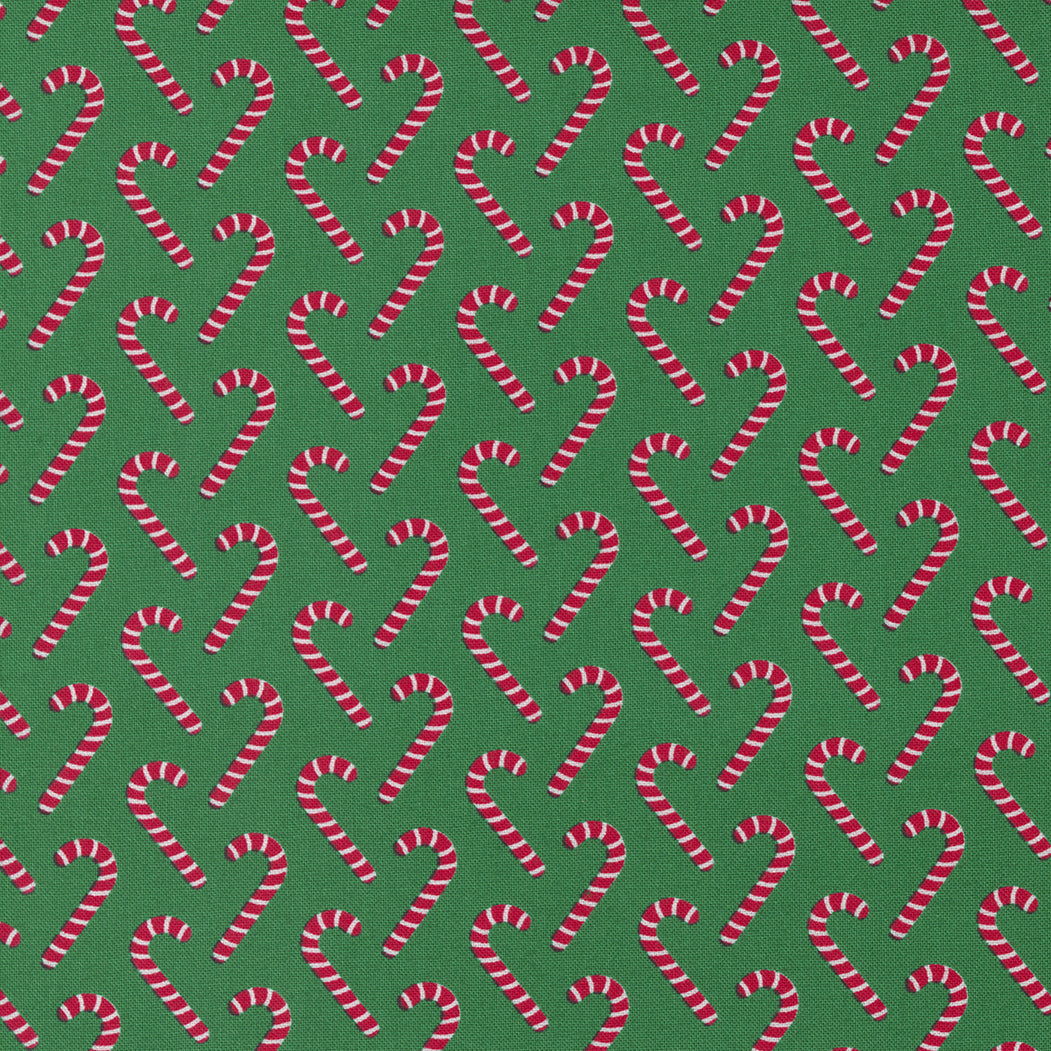 Candy Cane Lane from Moda Red candy canes on green background 24124 17