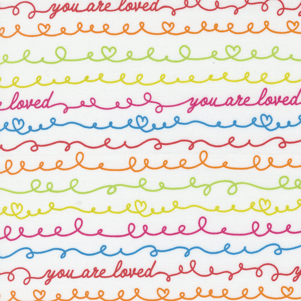 lines of swirly text on a white background with 'your are loved'  and 'hearts' as part of the swirly. Creativity Glows range Moda