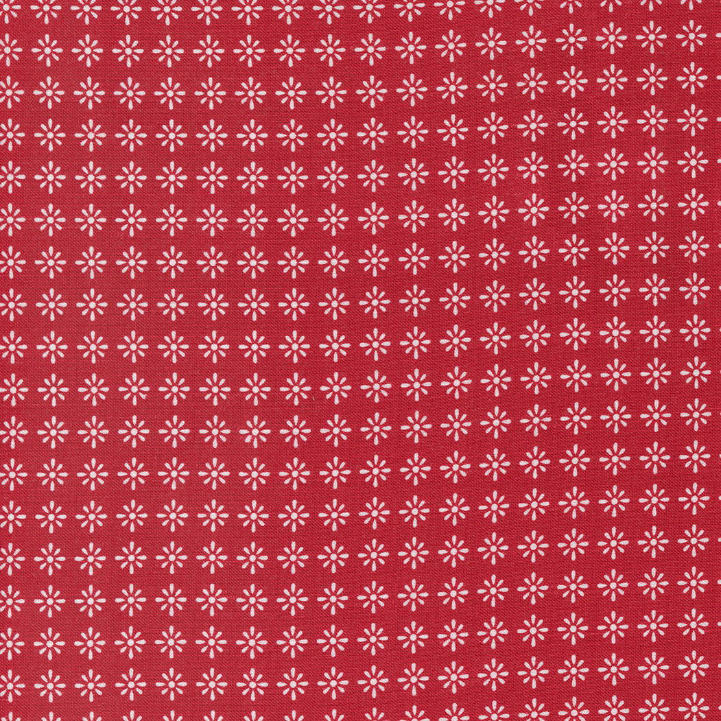 White flower design on red background Flirt fabric by Moda