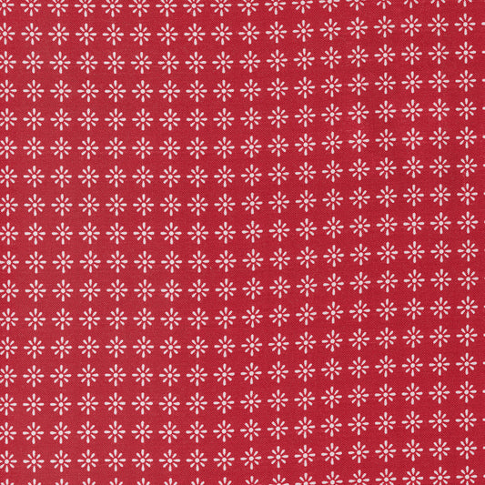White flower design on red background Flirt fabric by Moda