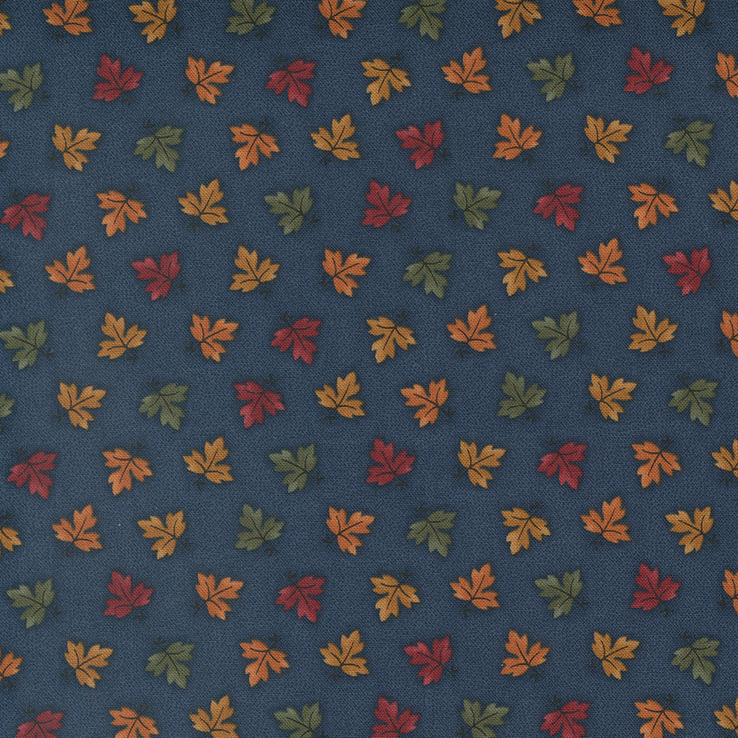 Autumn leaves on blue spruce print from Maple Hill by Moda.